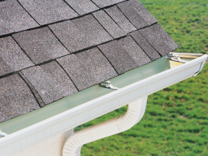 Clean gutters on a home's roof installed by a professional roofer in Unionville