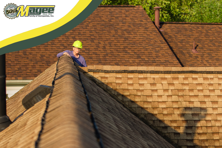 Technician inspecting a leaky roof in West Hartford